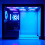 Showcase a modern PC CASE Manufacturer's sleek design featuring RGB lighting and glass panels for a gaming setup.