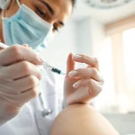 Administering an injectable weight loss treatment with emphasis on precision and care during the procedure.