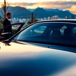 Enhance your travel experience with luxury car service Vancouver featuring a polished sedan and professional chauffeur