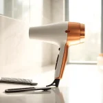 See the ionic hair dryer showcasing its sleek design and high-performance features on a stylish countertop.